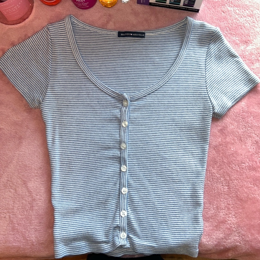 Brandy Melville
One Size fits all 
Blue striped button up 
Short sleeve
